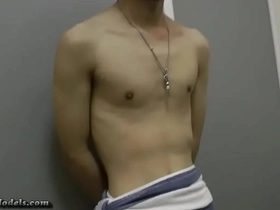 Asian twink gets a handjob from his gay porn casting agent