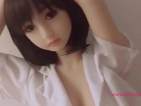 Dusaxdoll's Zara, a sexy, fully-silicone adult doll, enticing gay men