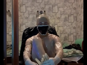 Man puts medical gloves on his feet